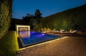 Zyra villa with pool and waterfall in New Cairo